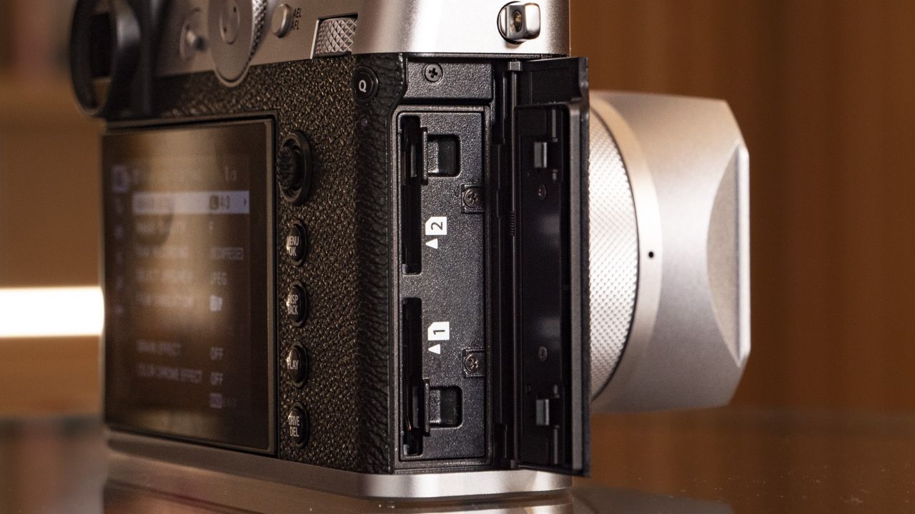 Closeup of the Fujifilm GFX100 RF medium-format compact camera's memory card ports