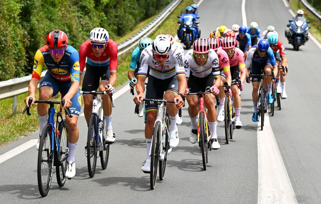 PAU FRANCE JULY 12 LR Toms Skujins of Latvia and Team Lidl Trek Kevin Geniets of Luxembourg and Team Groupama FDJ Mathieu van der Poel of Netherlands and Team Alpecin Deceuninck and Rui Costa of Portugal and Team EF Education EasyPost compete in the breakaway during the 111th Tour de France 2024 Stage 13 a 1653km stage from Agen to Pau UCIWT on July 12 2024 in Pau France Photo by Tim de WaeleGetty Images