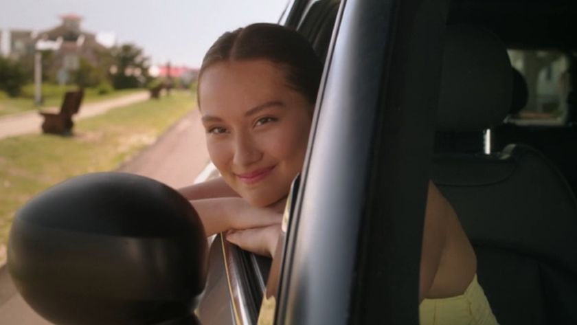 Belly leaning out the car window at the end of The Summer I Turned Pretty. 