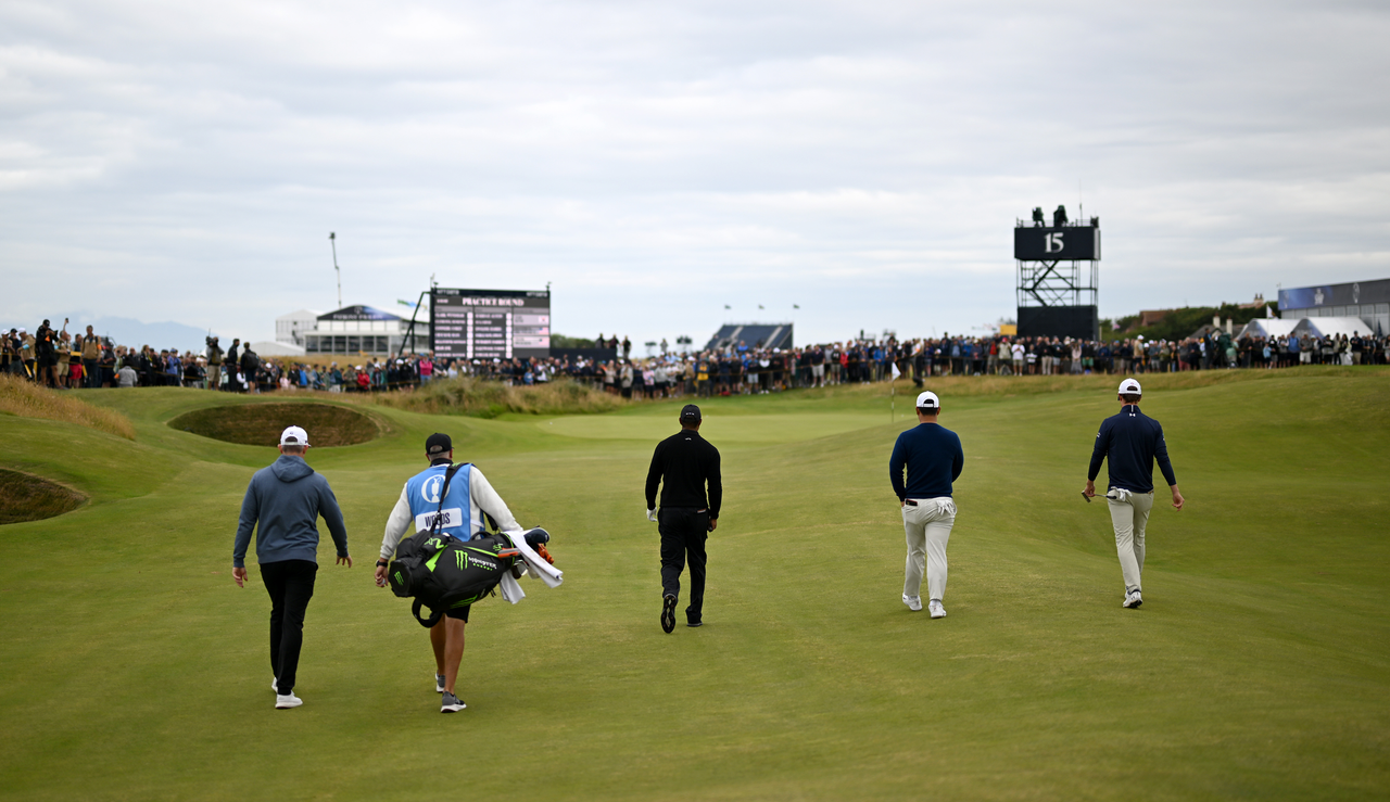 Tiger Woods walks down the fairway at The Open