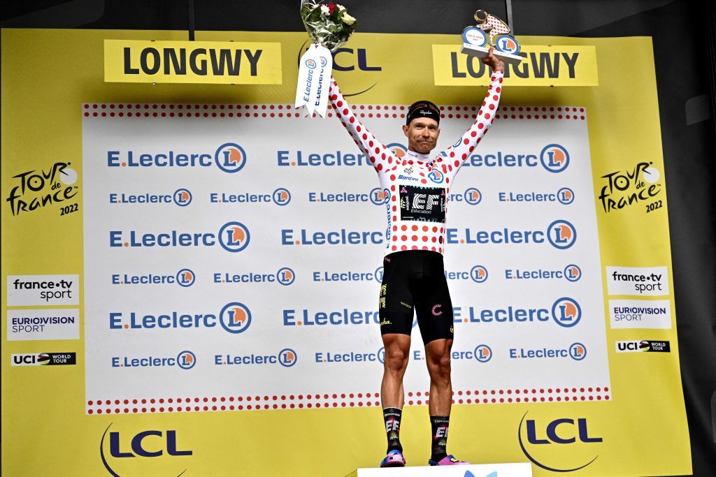 EF EducationEasypost teams Danish rider Magnus Cort Nielsen wearing the climbers dotted jersey celebrates on the podium after the 6th stage of the 109th edition of the Tour de France cycling race 2199 km between Binche in Belgium and Longwy in northern France on July 7 2022 Photo by Marco BERTORELLO AFP Photo by MARCO BERTORELLOAFP via Getty Images