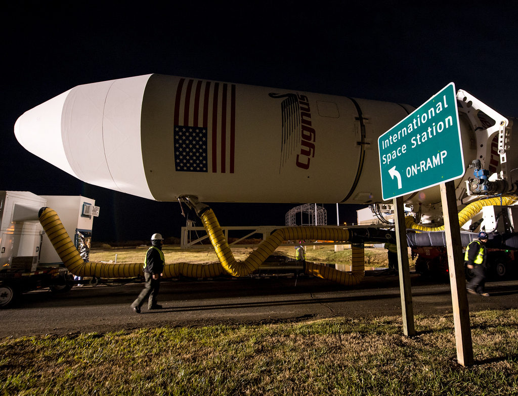 The Antares rocket carrying Orbital Sciences&#039; first cargo-carrying Cygnus spacecraft rolls to its launch pad at NASA&#039;s Wallops Flight Facility on Wallops Island, Va. ahead of launch. Liftoff is set for Jan. 7.