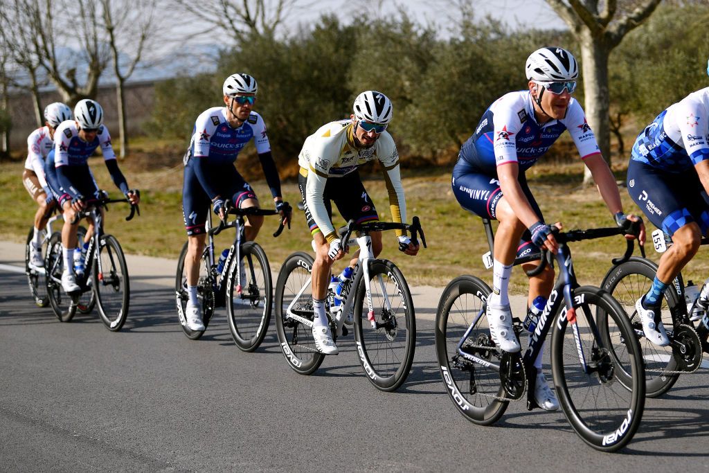 MANOSQUE FRANCE FEBRUARY 12 LR Julian Alaphilippe of France and Team QuickStep Alpha Vinyl Brown Points Jersey and Louis Vervaeke of Belgium and Team QuickStep Alpha Vinyl competes during the 6th Tour de La Provence 2022 Stage 2 a 1806km stage from Arles to Manosque 417m TDLP22 on February 12 2022 in Manosque France Photo by Luc ClaessenGetty Images