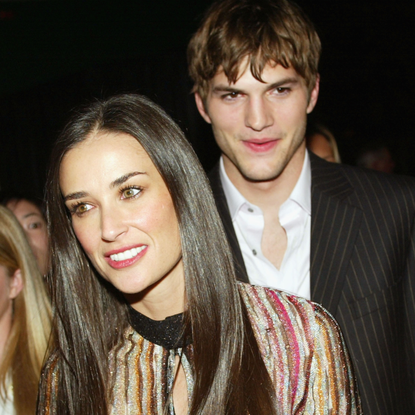 Actress Demi Moore and Ashton Kutcher arrive at the after-party for "Charlie's Angels: Full Throttle" at the Chinese Theater on June 18, 2003 in Los Angeles, California.