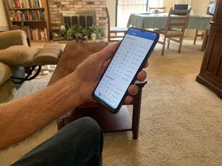 My dad testing his first smartphone