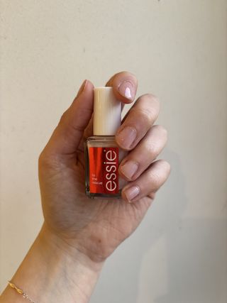 Mica Ricketts wearing Essie To The Rescue