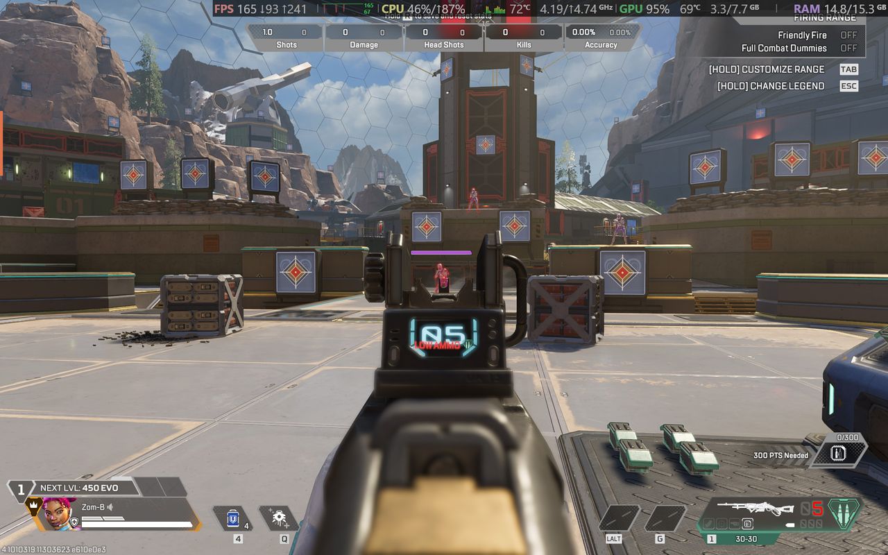 Apex Legends gameplay screenshot showing gun sights and UI elements running on an Alienware 15 laptop