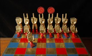 polychromed wood and gold leaft chess set