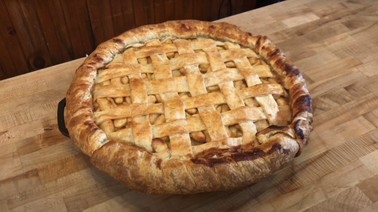 Dollywood's 25-lb Apple Pie on display on a cutting board.