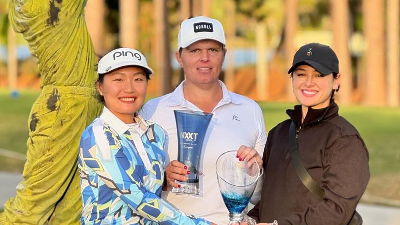 Hailey Davidson holds up the NXXT Women’s Classic trophy at Howey-in-the-Hills after her recent win