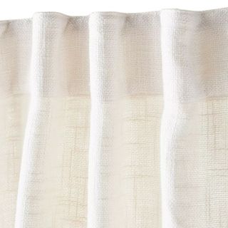 A linen blend white curtain
