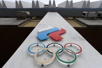 The Olympic rings are seen on the facade of the Russian Olympic Committee (ROC) building in Moscow on December 05, 2017.