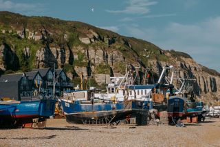 Fishing boats on a pebble beach