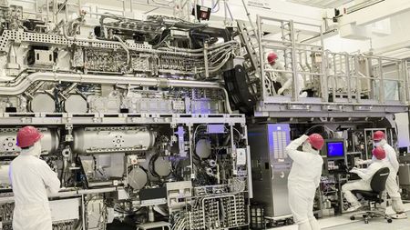 Intel engineers inspect a lithography machine