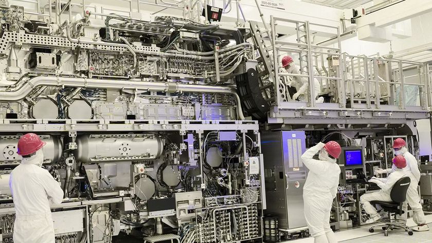 Intel engineers inspect a lithography machine