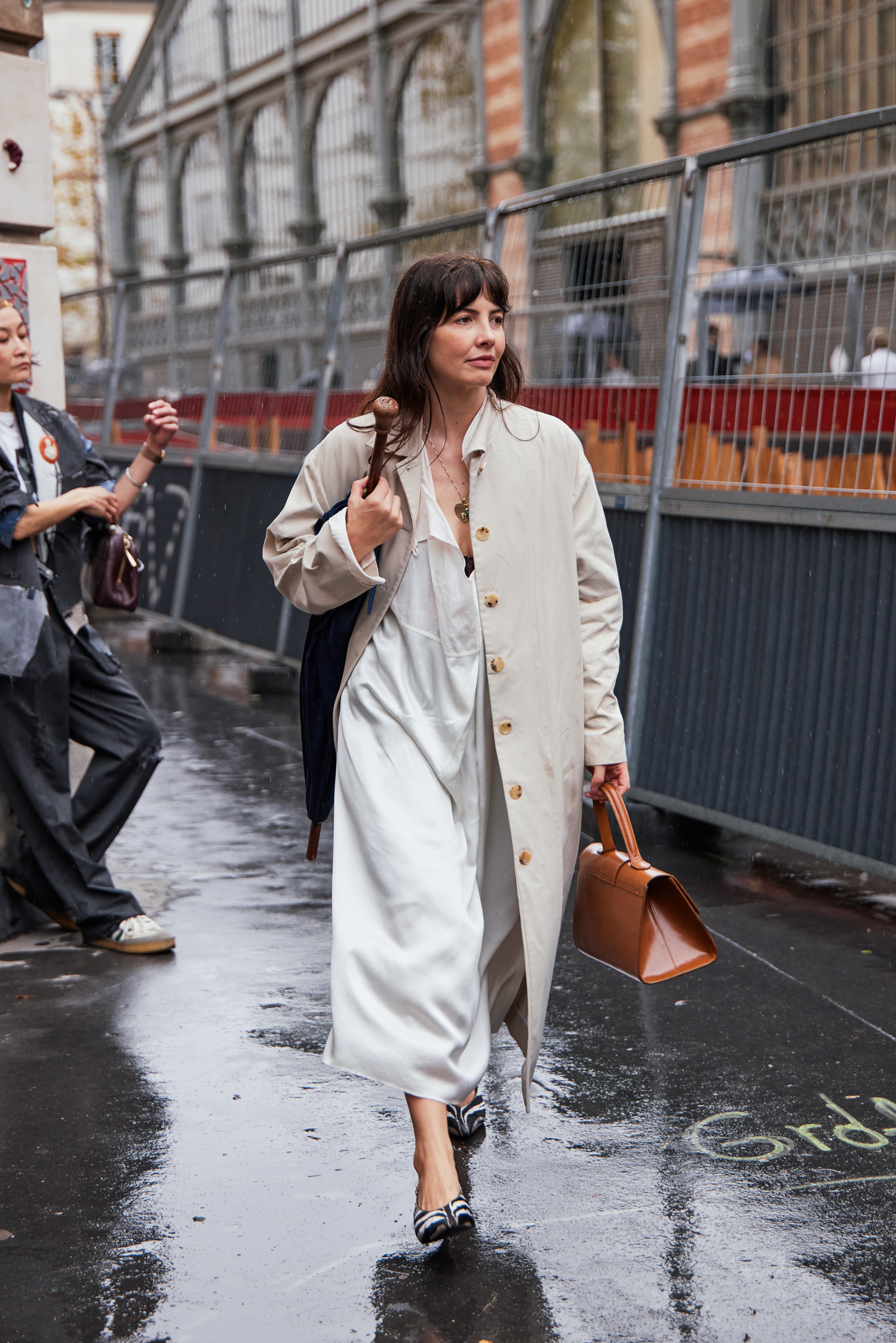 A Paris Fashion Week attendee shows off their outfit.