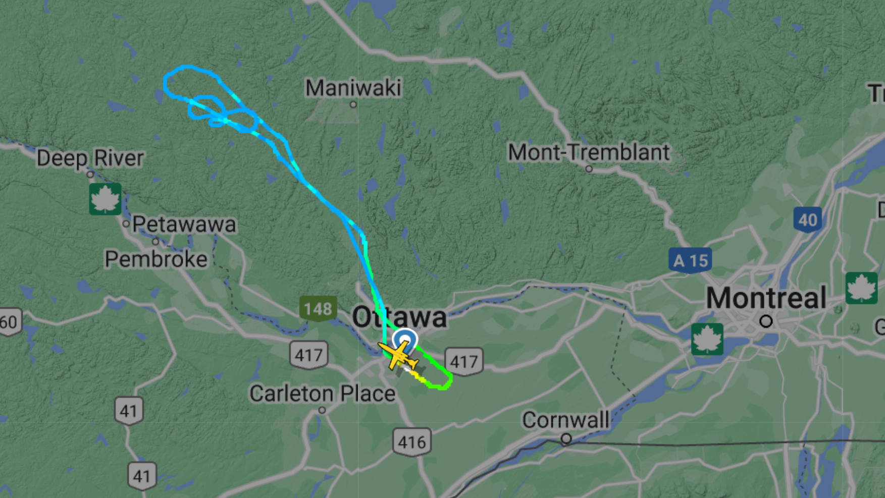a map of the region around ottawa. a plane icon is visible below the word "ottawa." to the upper left is a series of circles representing the plane's movements around a parabolic flight area