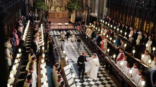 Prince Harry, Duke of Sussex and The Duchess of Sussex walk down the aisle at their wedding ceremony in St George's Chapel at Windsor Castle on May 19, 2018