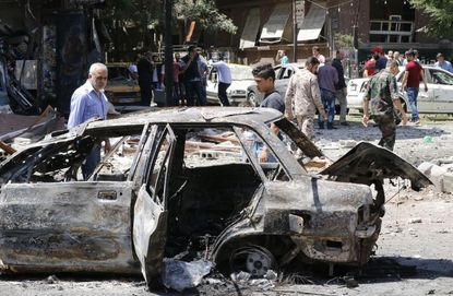 The aftermath of a car bombing in Damascus, Syria