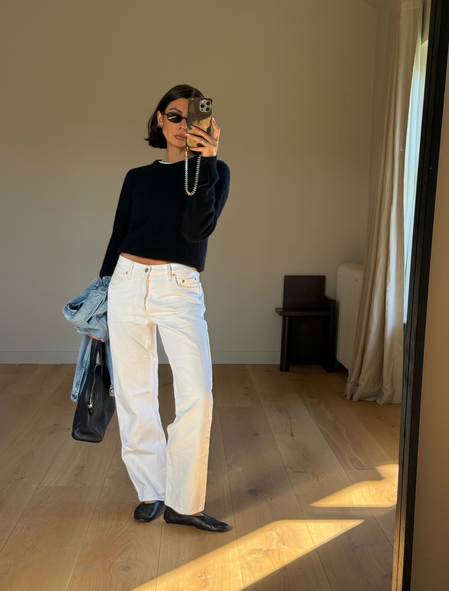 Influencer wearing white jeans