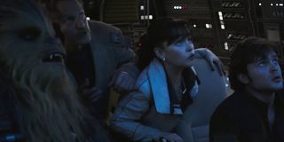 Solo: A Star Wars Story Woody Harrelson Emilia Clarke Alden Ehrenreich looking up at danger