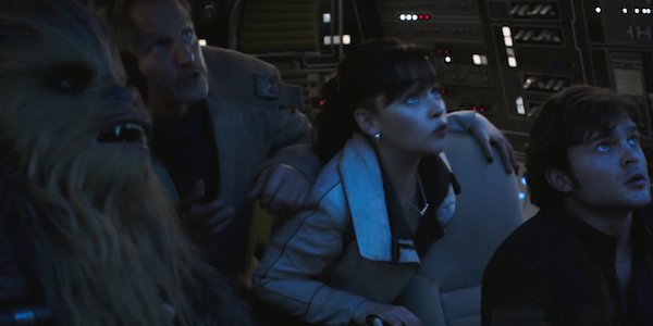 Solo: A Star Wars Story Woody Harrelson Emilia Clarke Alden Ehrenreich looking up at danger