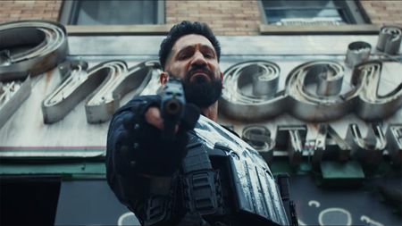 Frank Castle pointing a sawn-off shotgun directly into the camera in The Punisher: One Last Kill