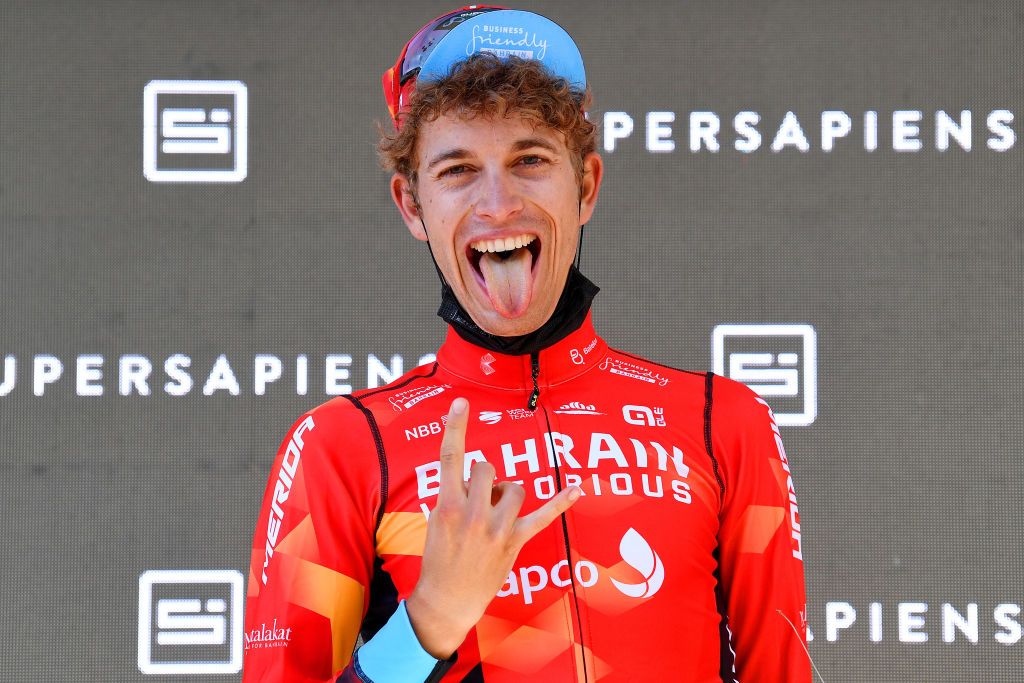 ANDERMATT SWITZERLAND JUNE 13 Gino Mder of Switzerland and Team Bahrain Victorious stage winner celebrates at podium during the 84th Tour de Suisse 2021 Stage 8 a 1595km stage from Andermatt to Andermatt UCIworldtour tds tourdesuisse on June 13 2021 in Andermatt Switzerland Photo by Tim de WaeleGetty Images