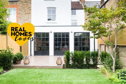 IQ glass single storey extension with Real Homes loves logo