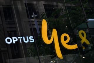 Optus logo displayed on a store front in Sydney