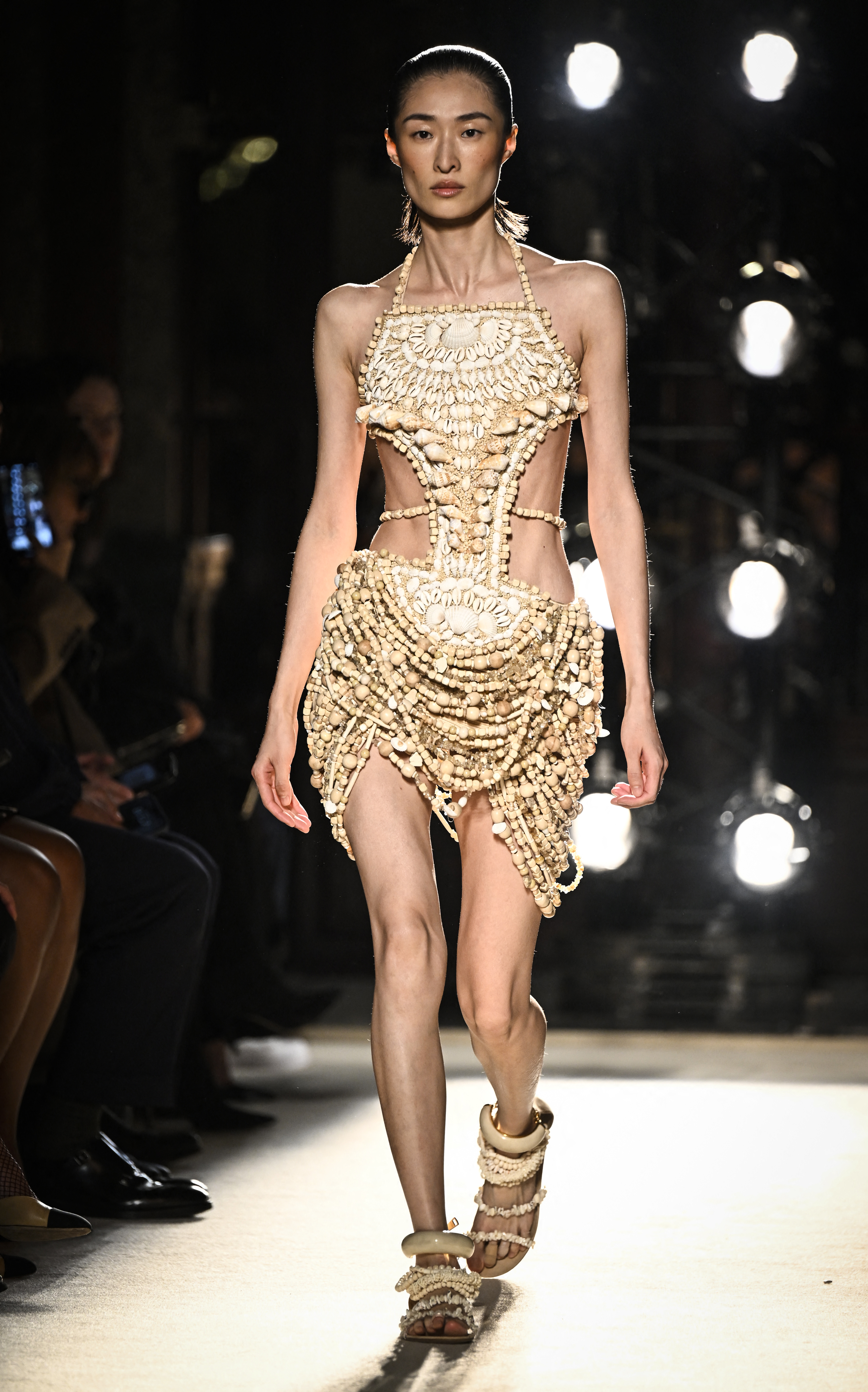 A model wearing an embellished dress at Olivier Rousteing's final Balmain show before he became Rabanne's creative director.