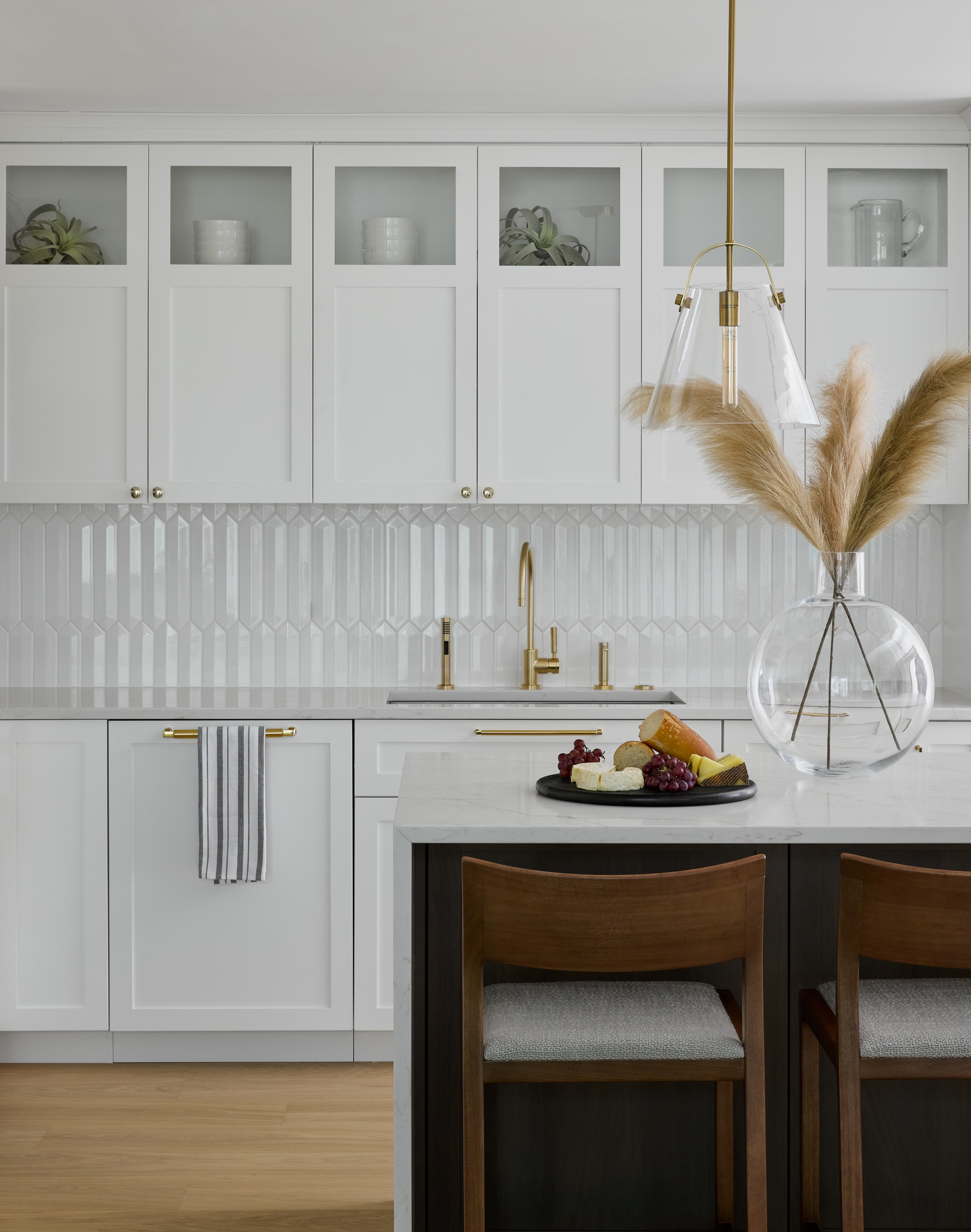 white kitchen with kitchen island centerpiece by Devon Grace