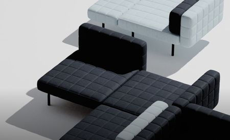 Black and grey padded sofas