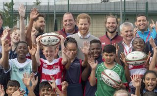 Prince Harry, Duke of Sussex meets pupils during his visit to The Rugby Football Union All Schools Programme