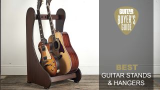 One electric and one acoustic guitar sat on a wooden guitar stand