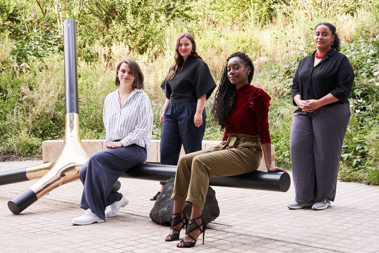 4 women smiling for the camera