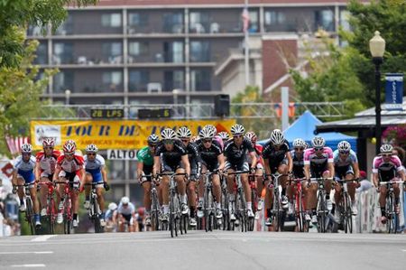 Groups of men fight for position as they head for the first turn.