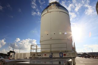 NASA's first Orion spacecraft and service module stack made a 20 minute trip from the Neil Armstrong Operations and Checkout Building at NASA’s Kennedy Space Center in Florida on Sept. 11, 2014, to the Payload Hazardous Servicing Facility. The spacecraft will launch on its first test flight in December 2014.