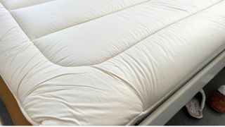 Corner of woolroom mattress topper