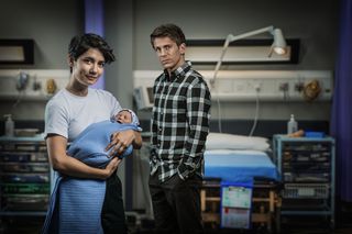 Two medics and a baby. Ethan Hardy with Fenisha and Bodhi in Casualty.