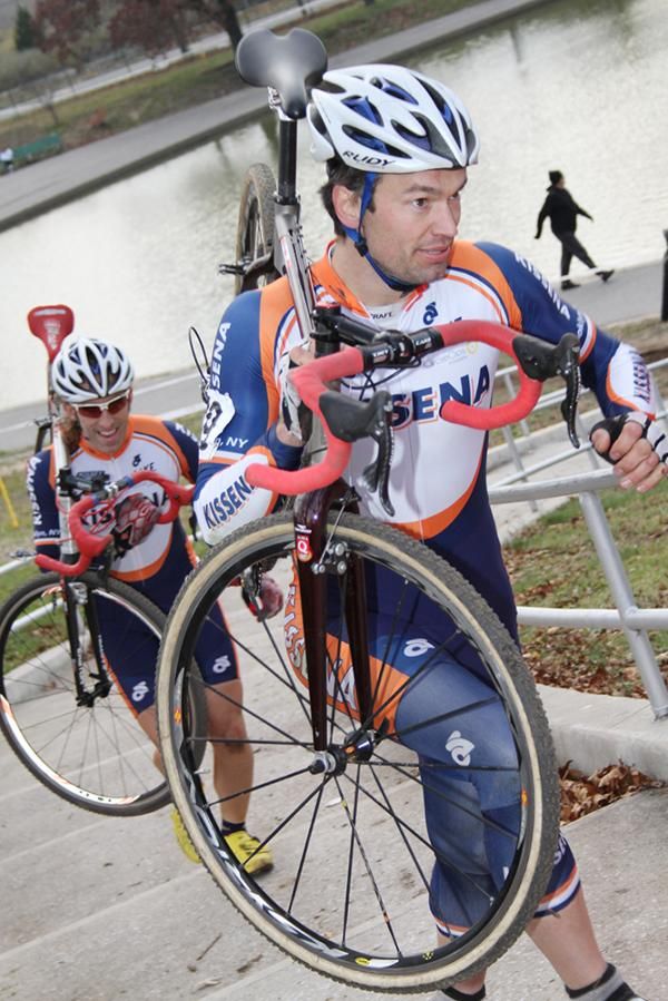 Kissena rider and race promoter, Myles Romanow, shows his teammate J.P. Partland how to take the stairs.