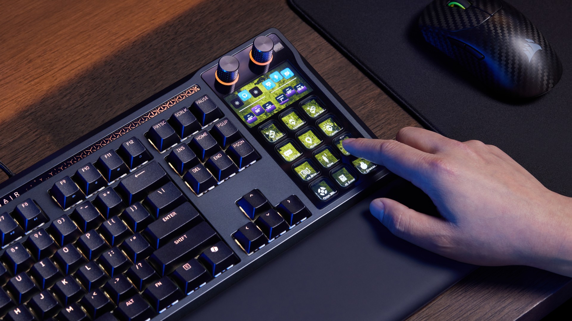 Hand using Stream Deck controls on Corsair Galleon 100 SD gaming keyboard