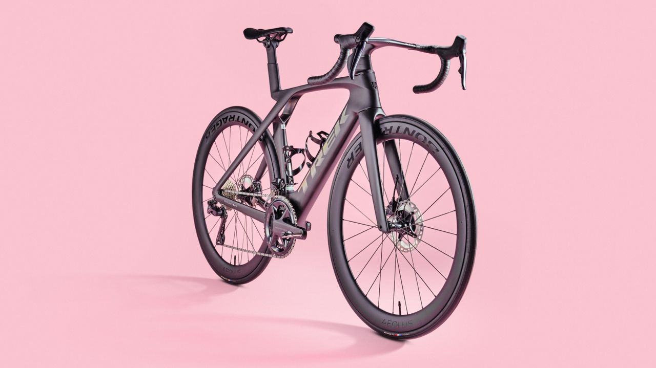 Trek Madone SLR 7 gen 7 on a pink background on a pink background