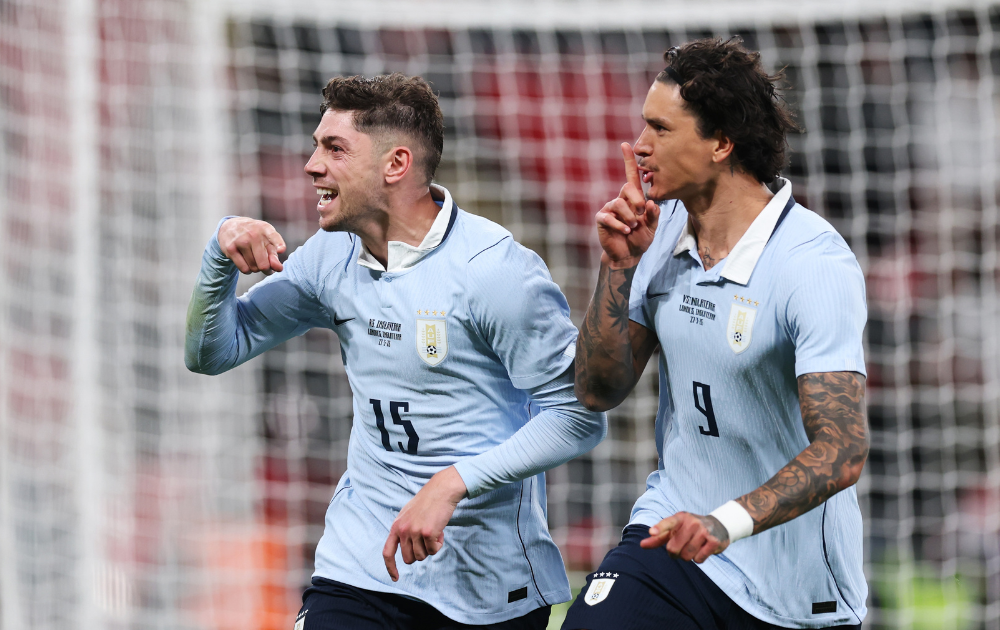 Federico Valverde of Uruguay celebrates scoring his team's first goal with teammate Darwin Nunez during the international friendly match between England and Uruguay at Wembley Stadium on March 27