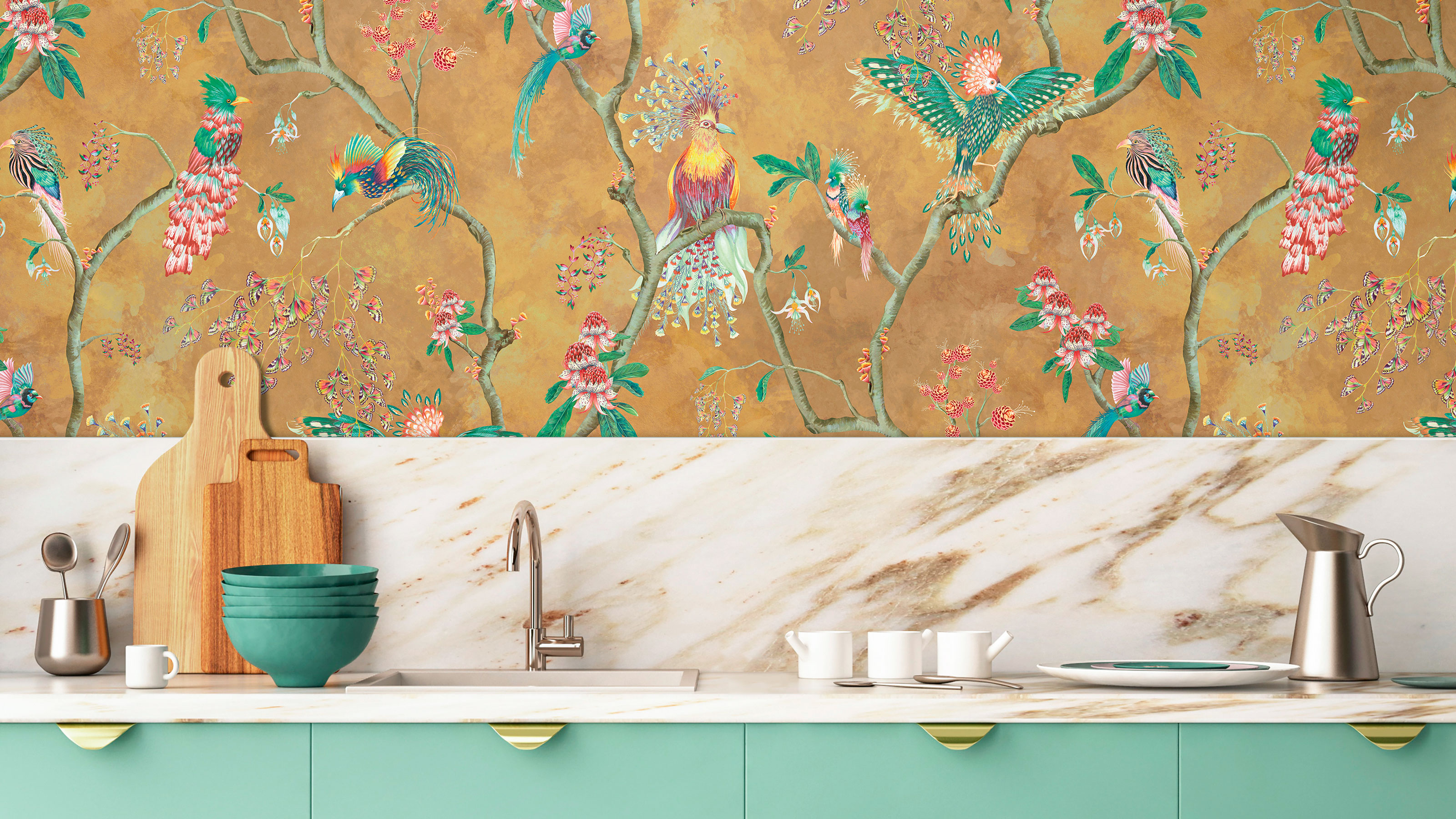 Gold floral wallpaper with birds, marble splashback and green cabinets