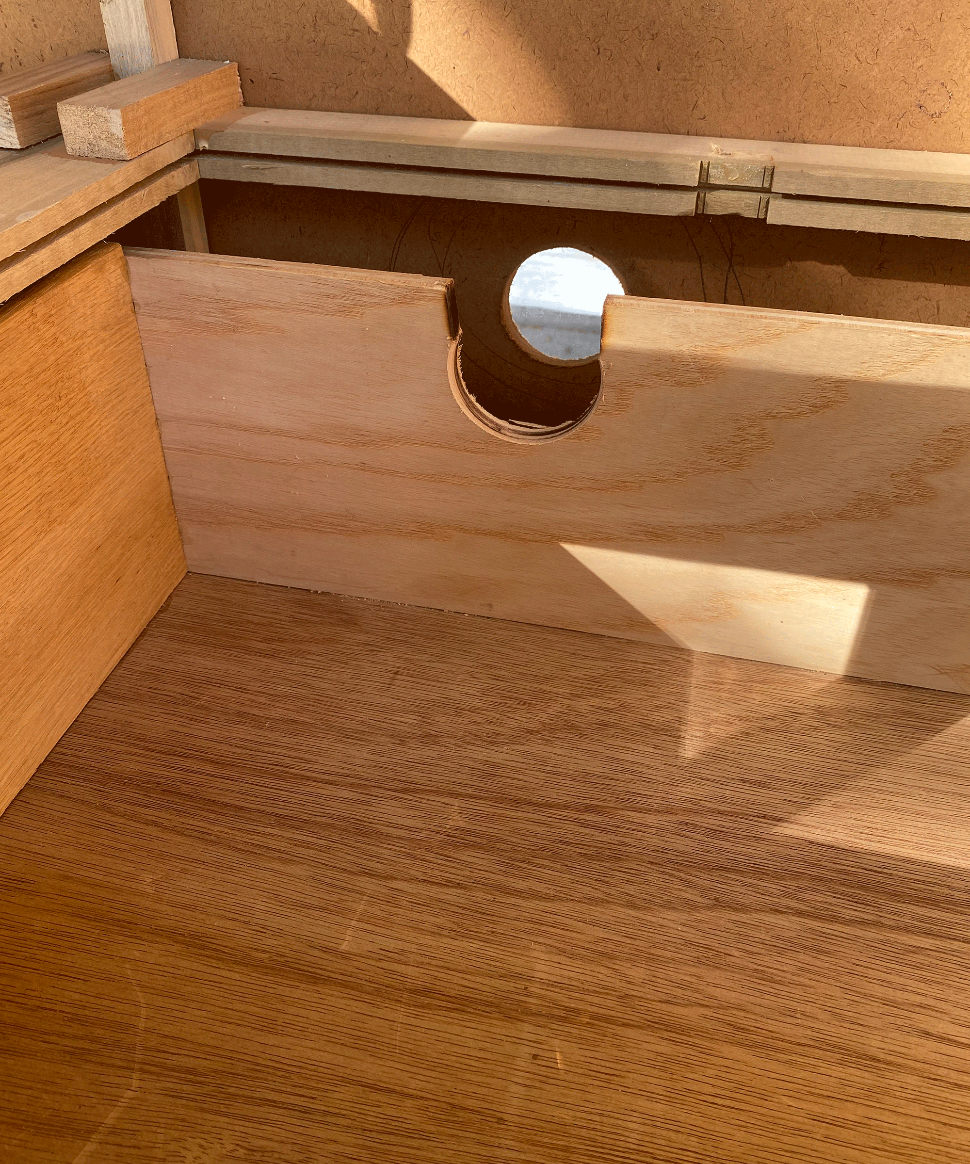 Carpentry work in wooden dresser vanity to accomodate for sanitaryware plumbing