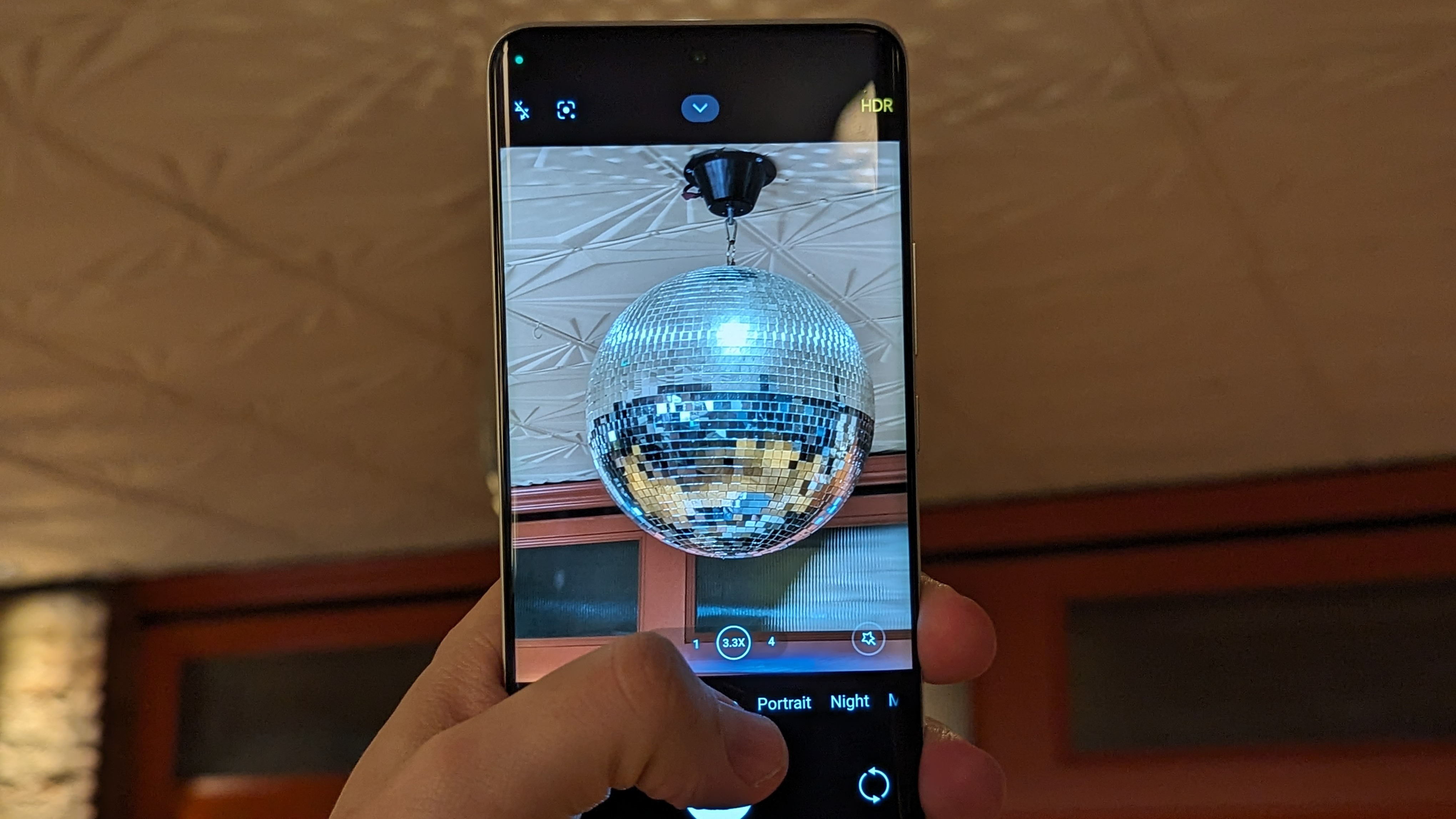 Xiaomi Redmi Note 13 Pro Plus took a photo of a mirror ball in dim lighting