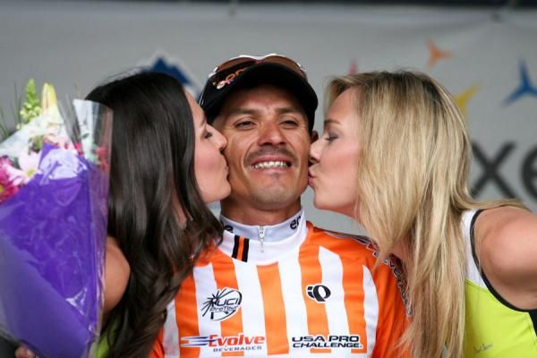 Francisco Colorado (EPM - Une) gets a kiss from the podium girls after winning the most aggressive rider jersey