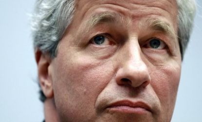 JPMorgan Chase's botched trading loss is now estimated at $9 billion, which may call CEO Jamie Dimon's future into question.
