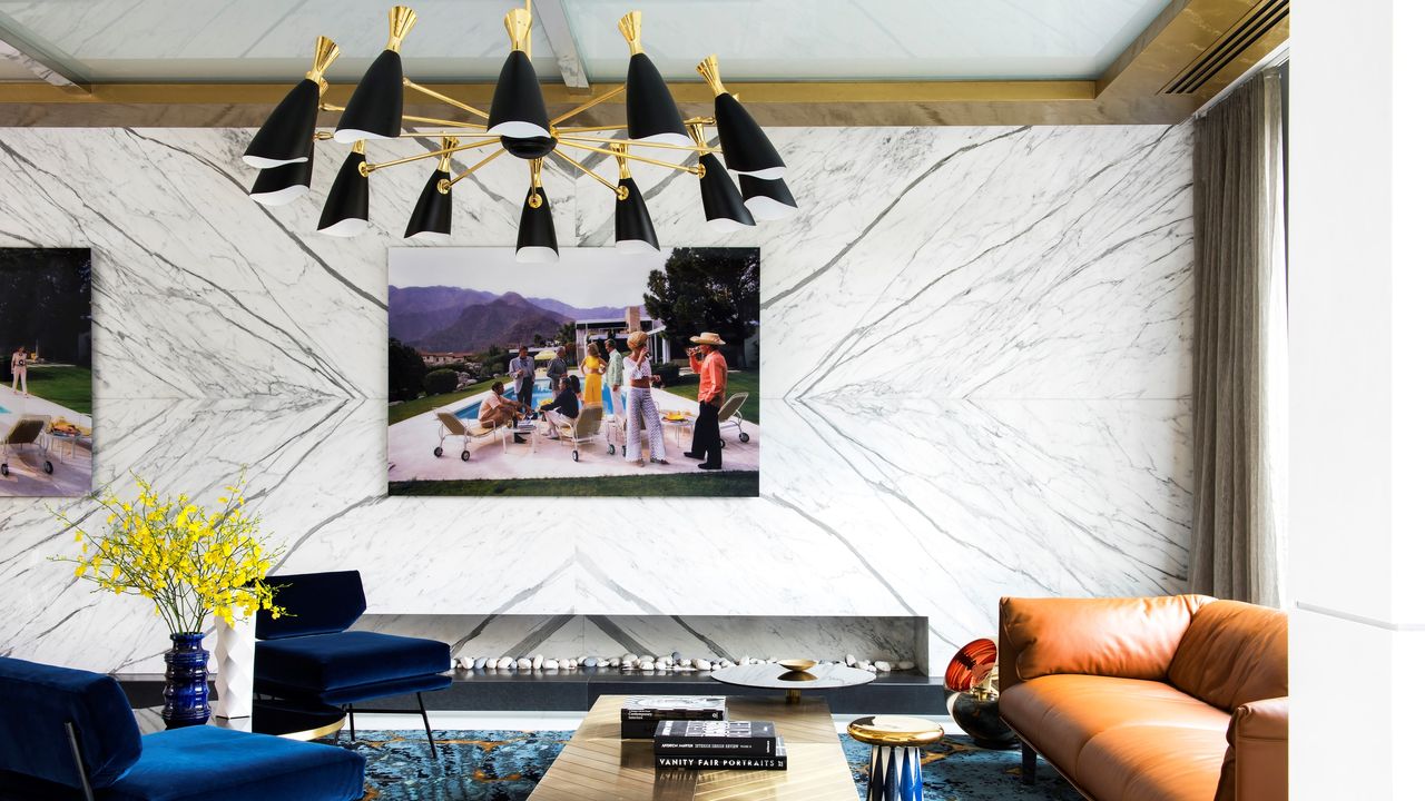 A living room with a decorative ceiling light